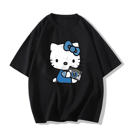 Black t-shirt with a cartoon character holding a camera on a white background