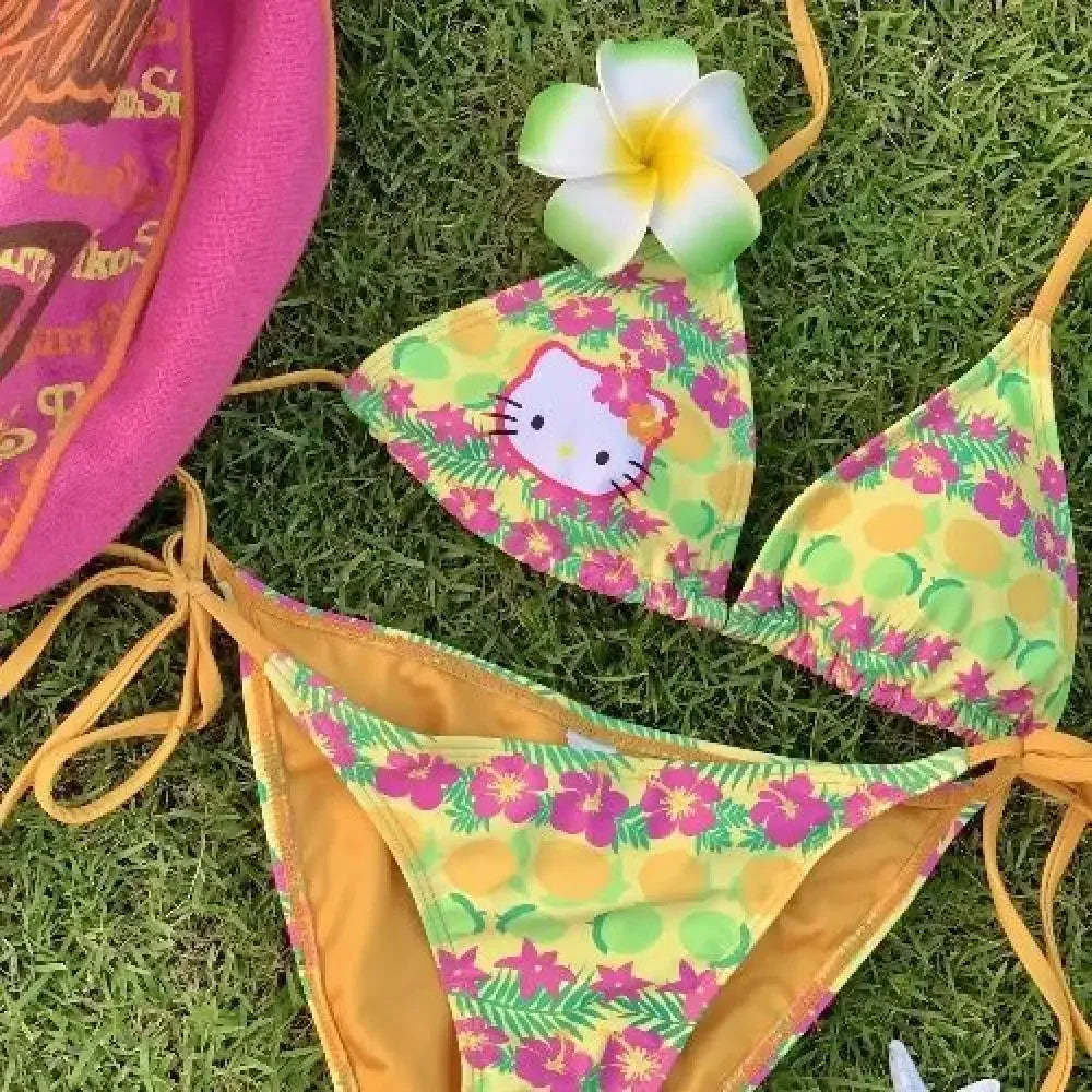 Colorful bikini set with floral pattern on grass