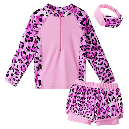 Pink and purple leopard print children's swimsuit set with headband on a white background