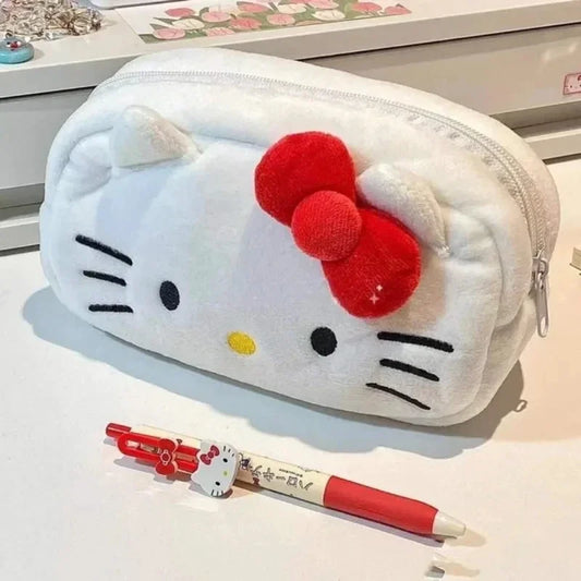 Hello Kitty pencil case with two pens on a light surface