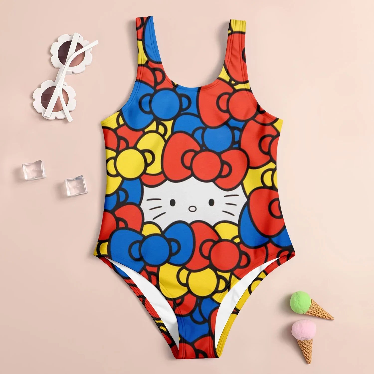 Colorful swimsuit with cartoon character design on a beige background