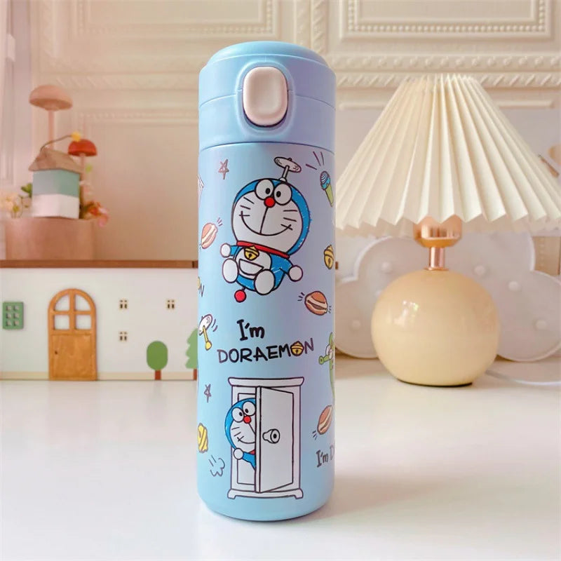 Blue thermos bottle with Doraemon design on a white surface