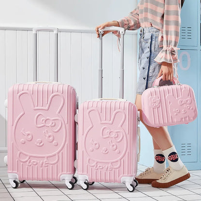 Person holding a pink suitcase with a Hello Kitty design in a locker room.