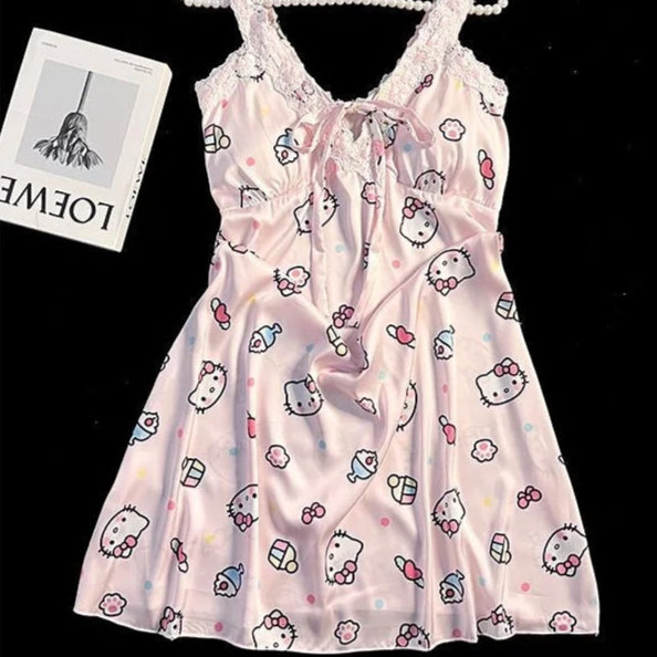Hello Kitty patterned dress on a hanger with a black background