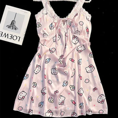 Hello Kitty patterned dress on a hanger with a black background