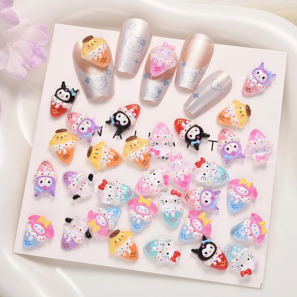 Set of colorful nail art stickers on a white tray