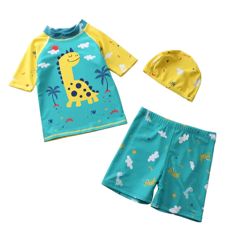 Children's swim set with a dinosaur-themed shirt, shorts, and hat on a white background