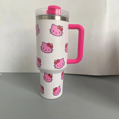 White tumbler with pink handle and Hello Kitty face pattern on a white background