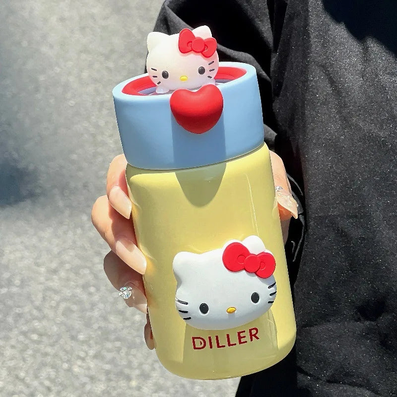 Hello Kitty-themed water bottle held by a person