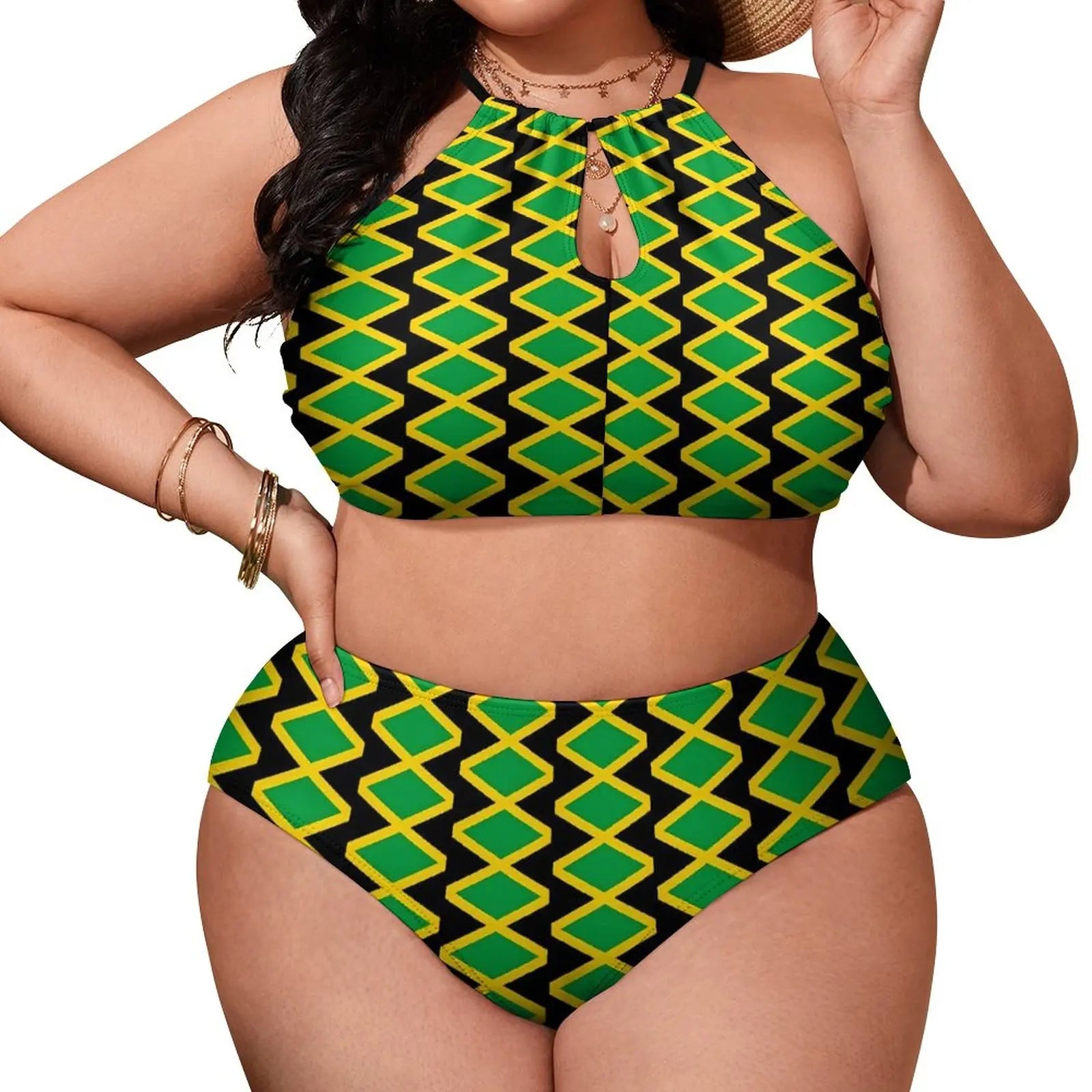 Woman wearing a green and black patterned two-piece swimsuit on a white background