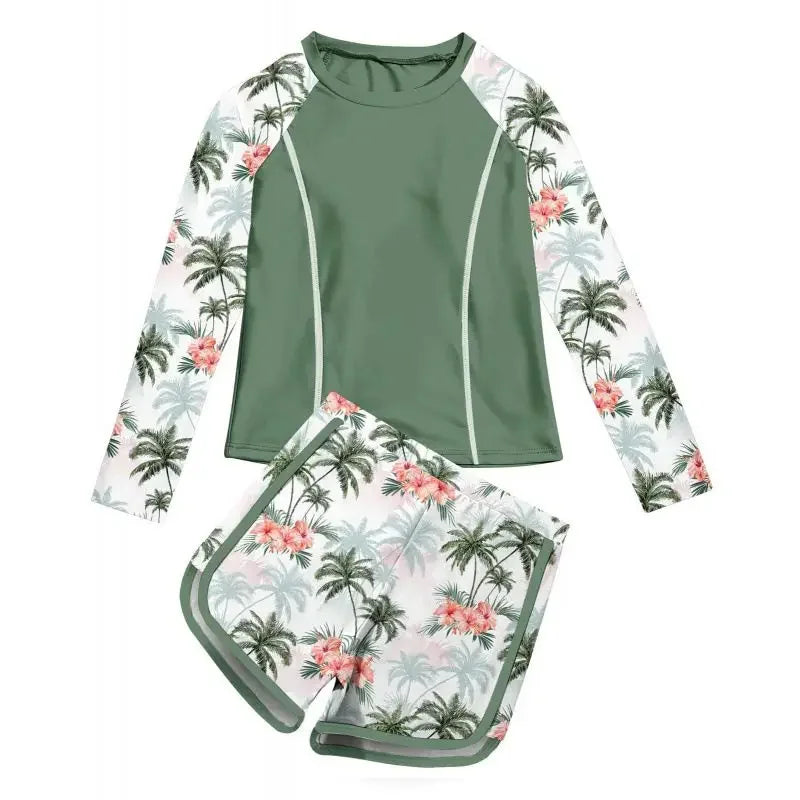 Two-piece swimsuit with palm tree and floral pattern on a white background