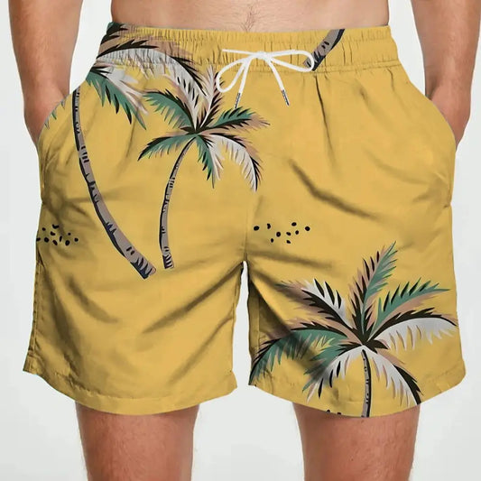 Yellow swim shorts with palm tree design on a white background