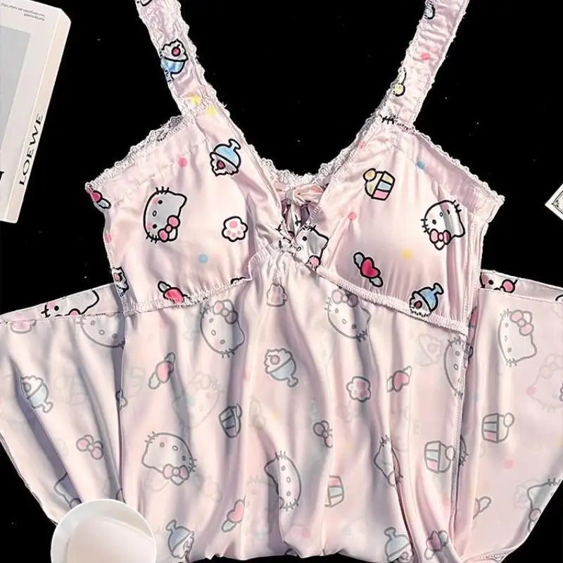 Pink babydoll dress with cartoon character pattern on a black background