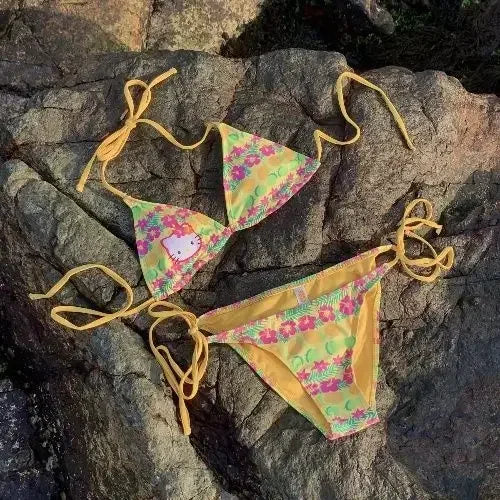 Floral bikini set on a rocky surface
