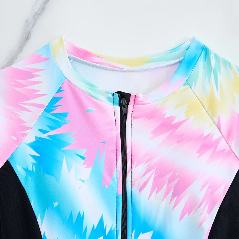 Colorful tie-dye swimsuit with a black zipper on a white background