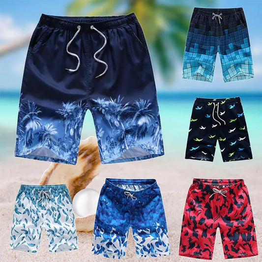 Collection of various swim shorts with different patterns on a beach background.