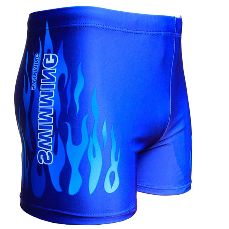 Blue swim shorts with flame design and brand logo on a white background