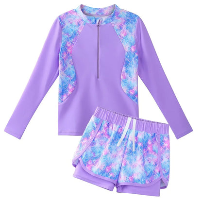 Purple and blue patterned two-piece swimsuit on a white background