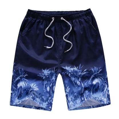 Navy blue shorts with tropical pattern on a white background