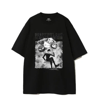 Black t-shirt with graphic design featuring a character and text on a white background