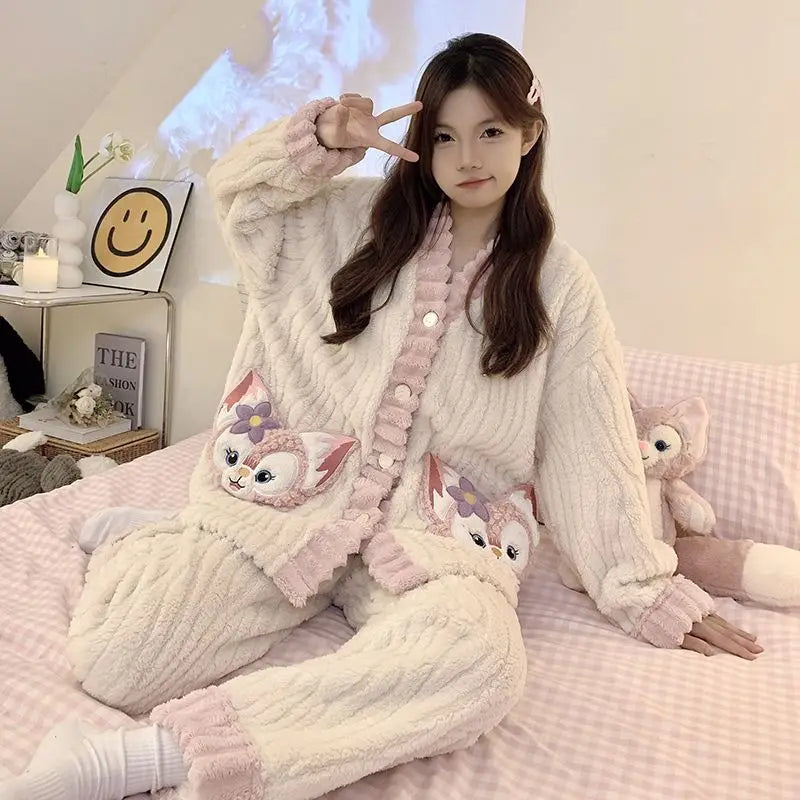 Person wearing a cozy, plush outfit with animal-themed design on a bed.
