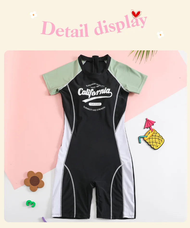 Black swimsuit with 'California' text on a pink background