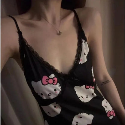 Black slip dress with Hello Kitty print worn by a person.