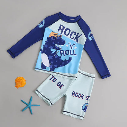 Children's swimsuit set with dinosaur graphic and text on a gray background
