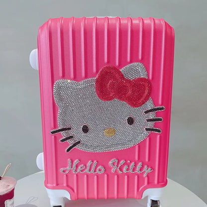Pink suitcase with Hello Kitty design on a white surface