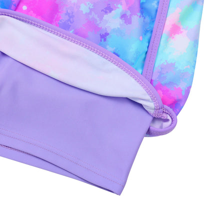 Close-up of a purple swimsuit with colorful patterned lining on a white background