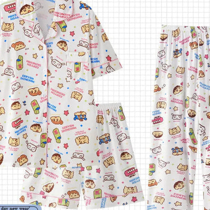 Children's pajama set with cartoon patterns on a checkered background, featuring the brand 'PAJAMSO'.