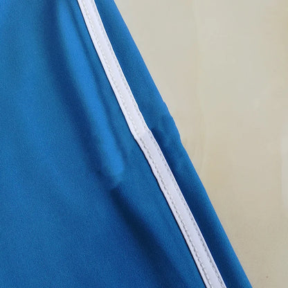 Blue fabric with a white stripe on a beige background