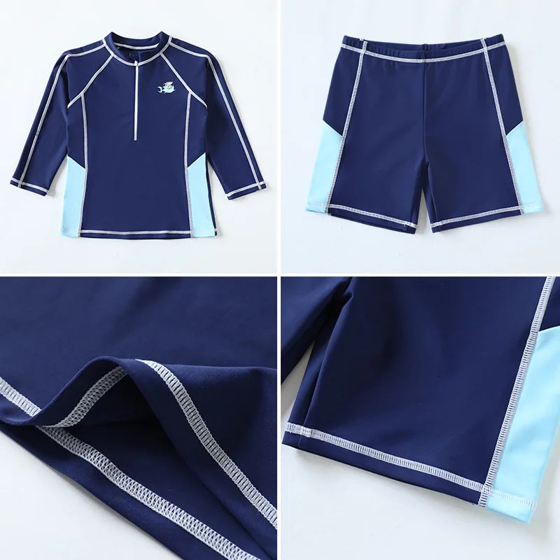 Navy blue and light blue swim set with long-sleeve rash guard and shorts on a white background.