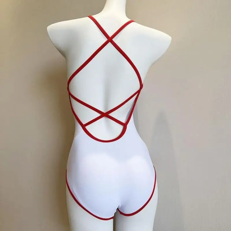 White swimsuit with red straps on a mannequin against a neutral background