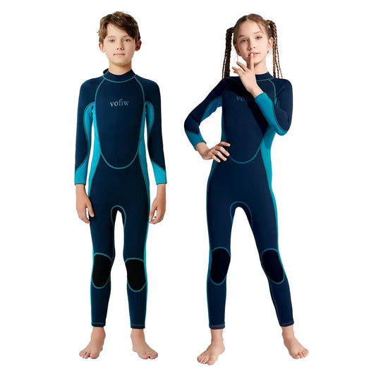 Two children wearing blue and black wetsuits on a white background