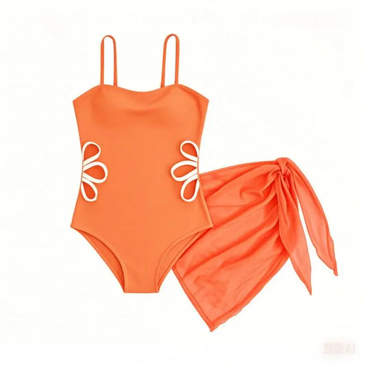 Orange swimsuit with floral details on a white background