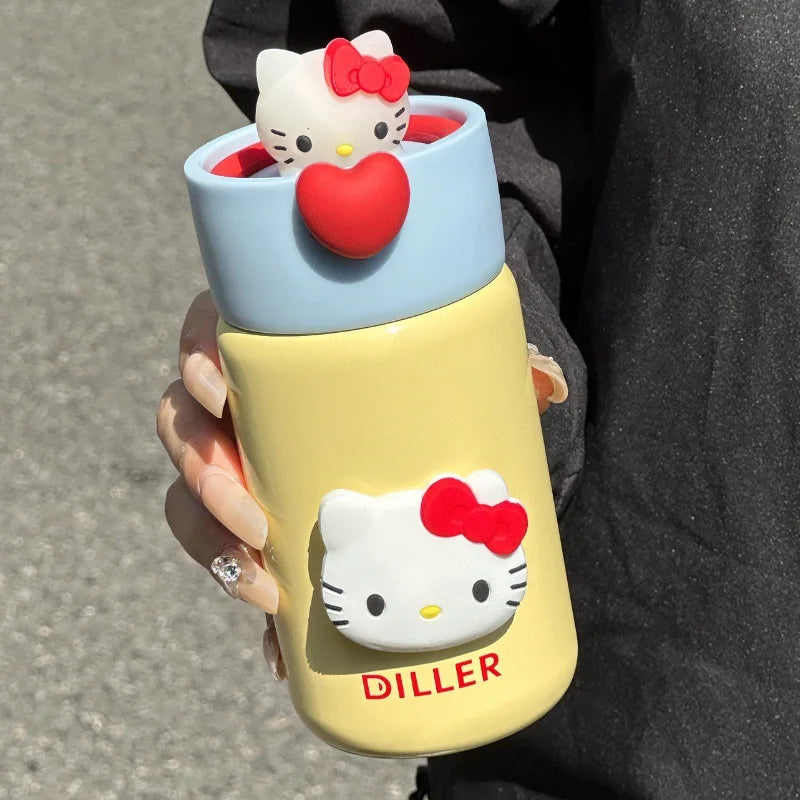 Hello Kitty-themed water bottle held by a person