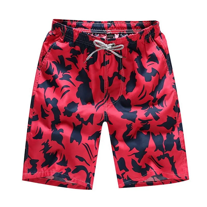 Red swim shorts with black abstract patterns on a white background