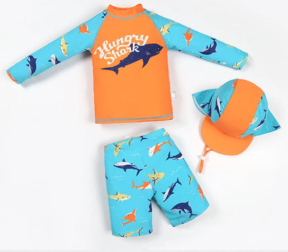 Children's shark-themed swimsuit set with hat on a white background
