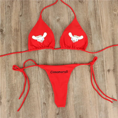 Red bikini set with Cinnamoroll branding on a wooden surface