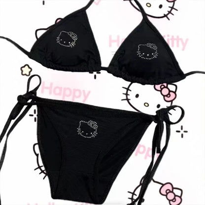 Black bikini set with Hello Kitty design on a white background with Hello Kitty graphics.