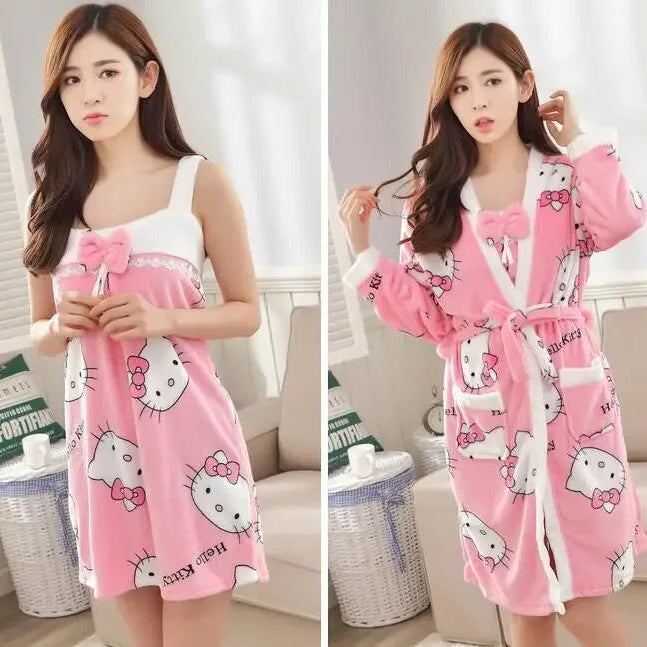 Woman wearing a pink Hello Kitty dress and robe in a room.