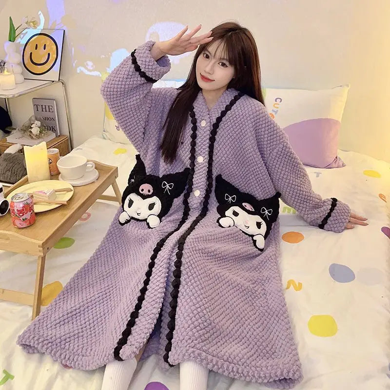 Woman wearing a long purple robe with cartoon character patches in a cozy room.