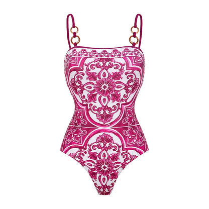 Pink and white patterned swimsuit on a white background