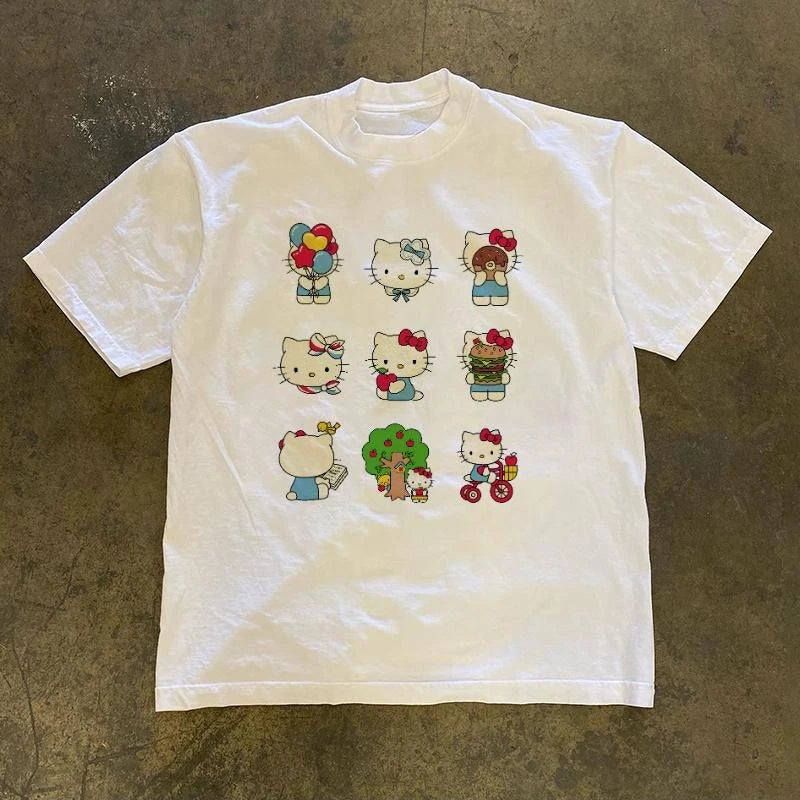 White t-shirt with Hello Kitty illustrations on a textured surface
