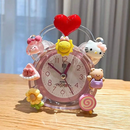 Cute decorative clock with cartoon characters on a wooden surface