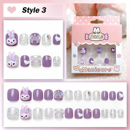 Set of purple and silver nail designs with packaging labeled 'Manicure' on a pink background.
