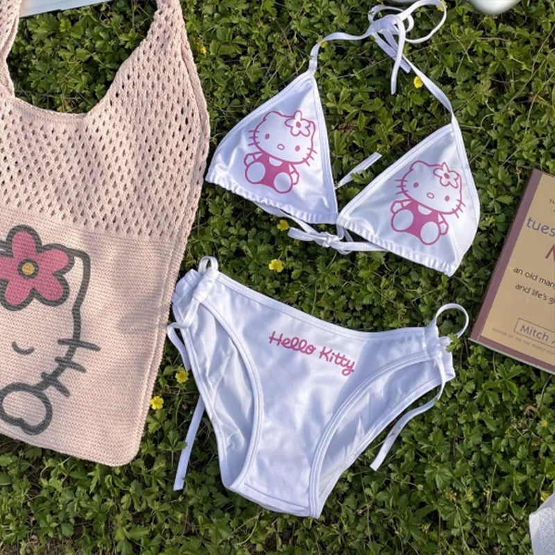 Hello Kitty bikini set and bag on grass