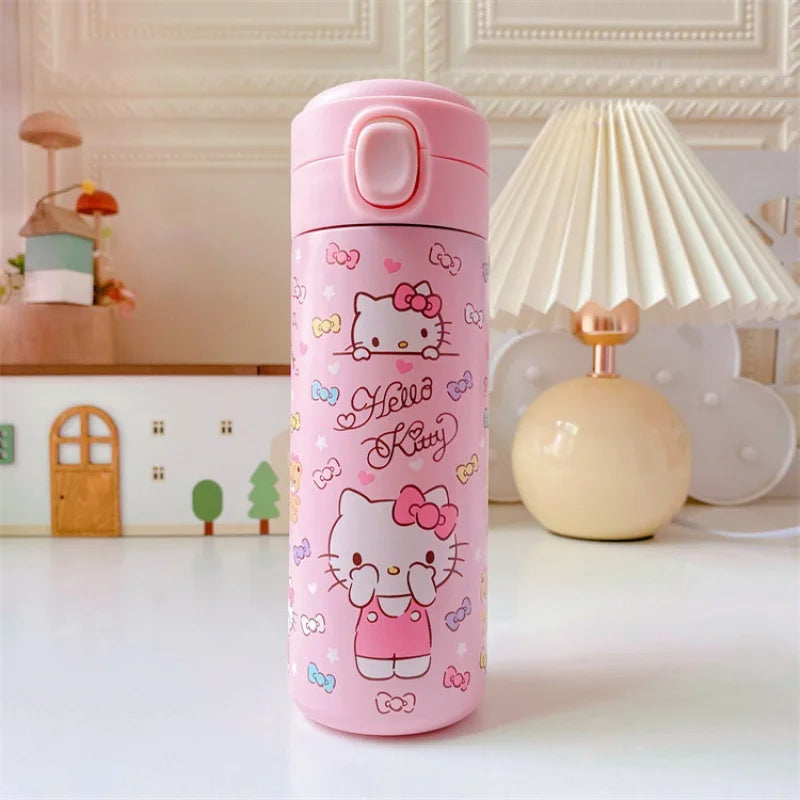 Pink Hello Kitty water bottle on a white surface with a decorative background