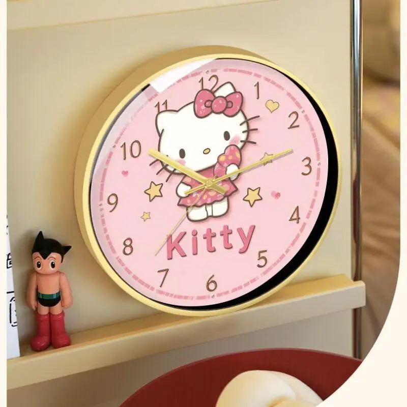 Hello Kitty clock on a shelf with a small figurine